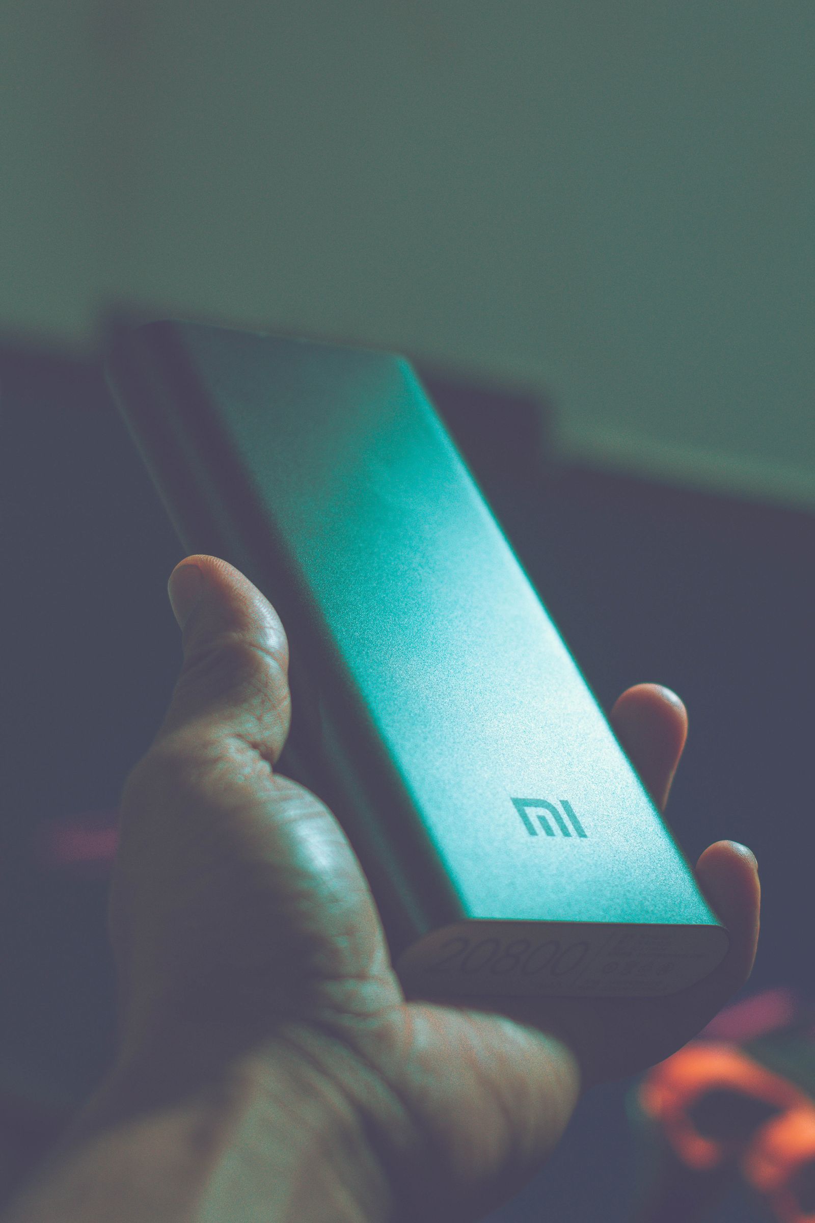 Hand holding a portable power bank